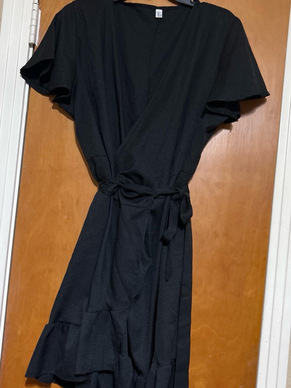 Classic Black Wrap Dress with Ruffle Hem